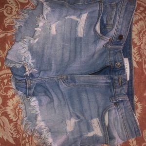 Eunina distressed, light-washed jean shorts